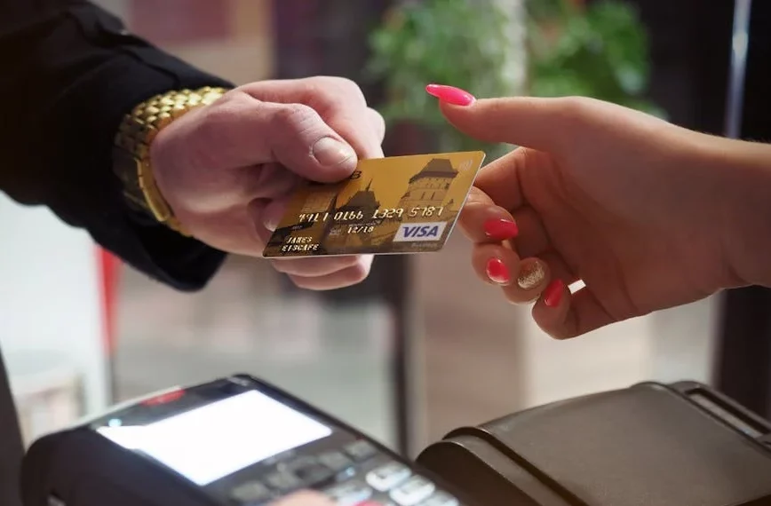 Person paying using a credit card